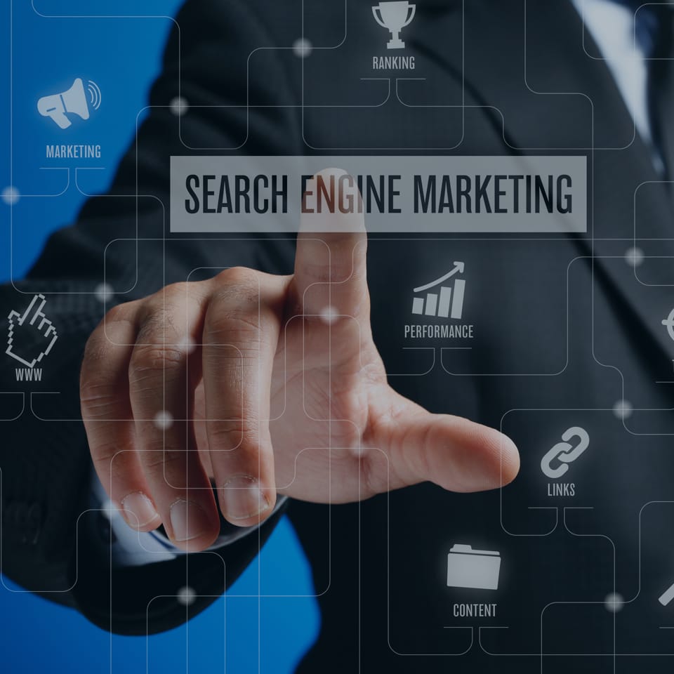 A person in business attire points to a transparent interface displaying the text "Search Engine Marketing." Around the text are icons and words related to marketing, including "Marketing," "Performance," "Ranking," "Links," "Content," and "WWW.