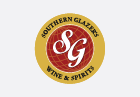 The image shows the circular logo of Southern Glazer's Wine & Spirits. It consists of a yellow outer ring with the company name written in black and a red inner circle featuring the white initials "SG" in a decorative font.